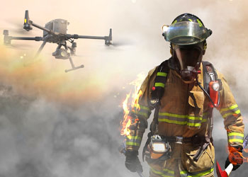 a fire fighter and a drone fighting a fire